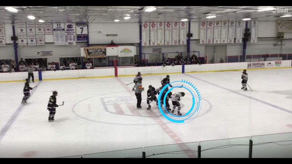 Hockey play with the original highlight circle marking the athlete