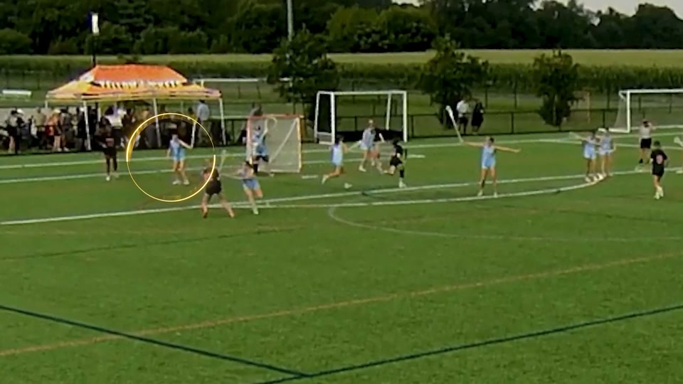 Lacrosse play with the original highlight circle marking the athlete