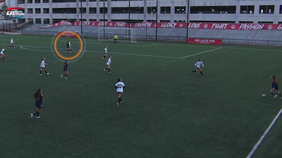 Soccer play with the original highlight circle marking the athlete